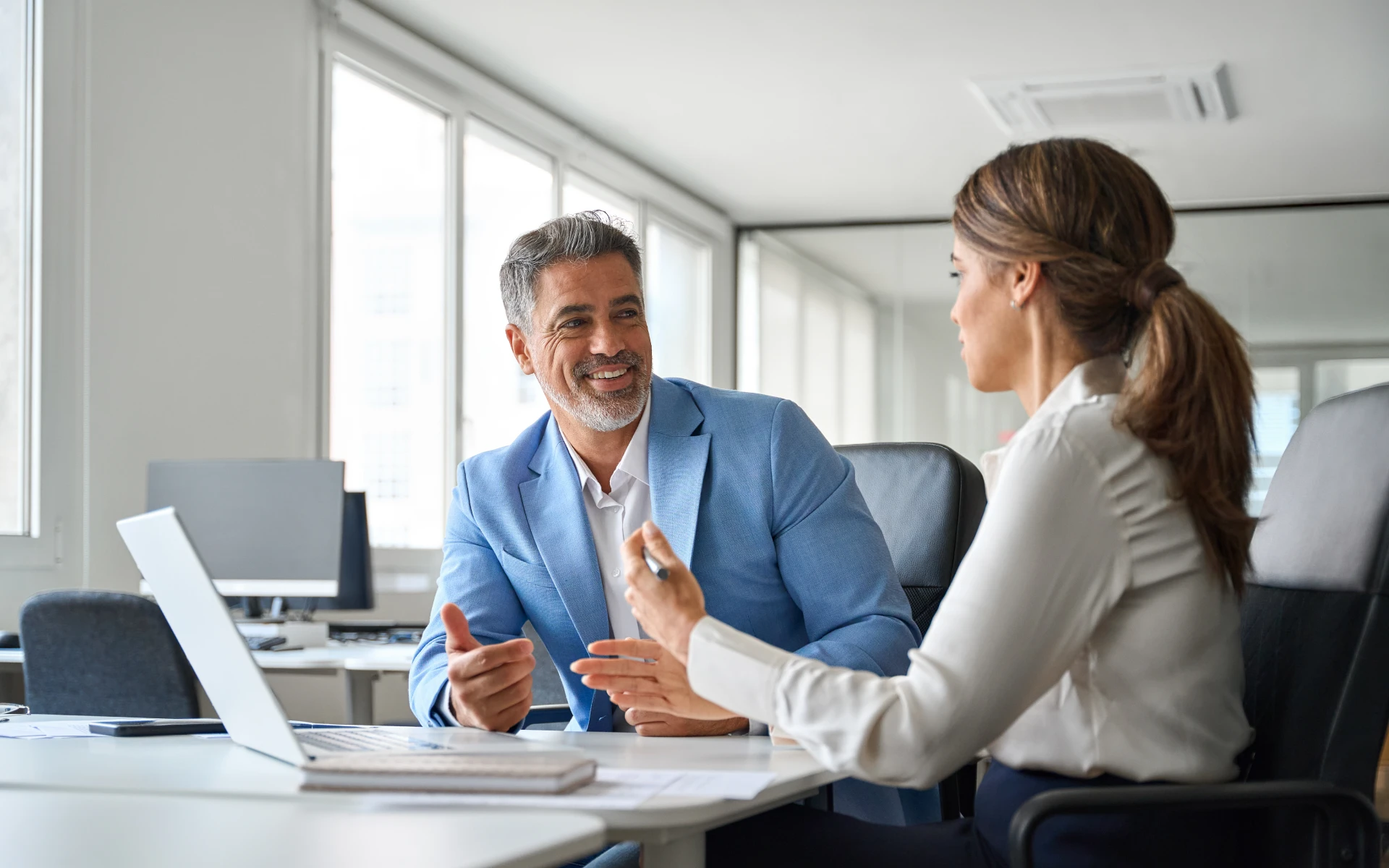 Business colleagues having a discussion in office
