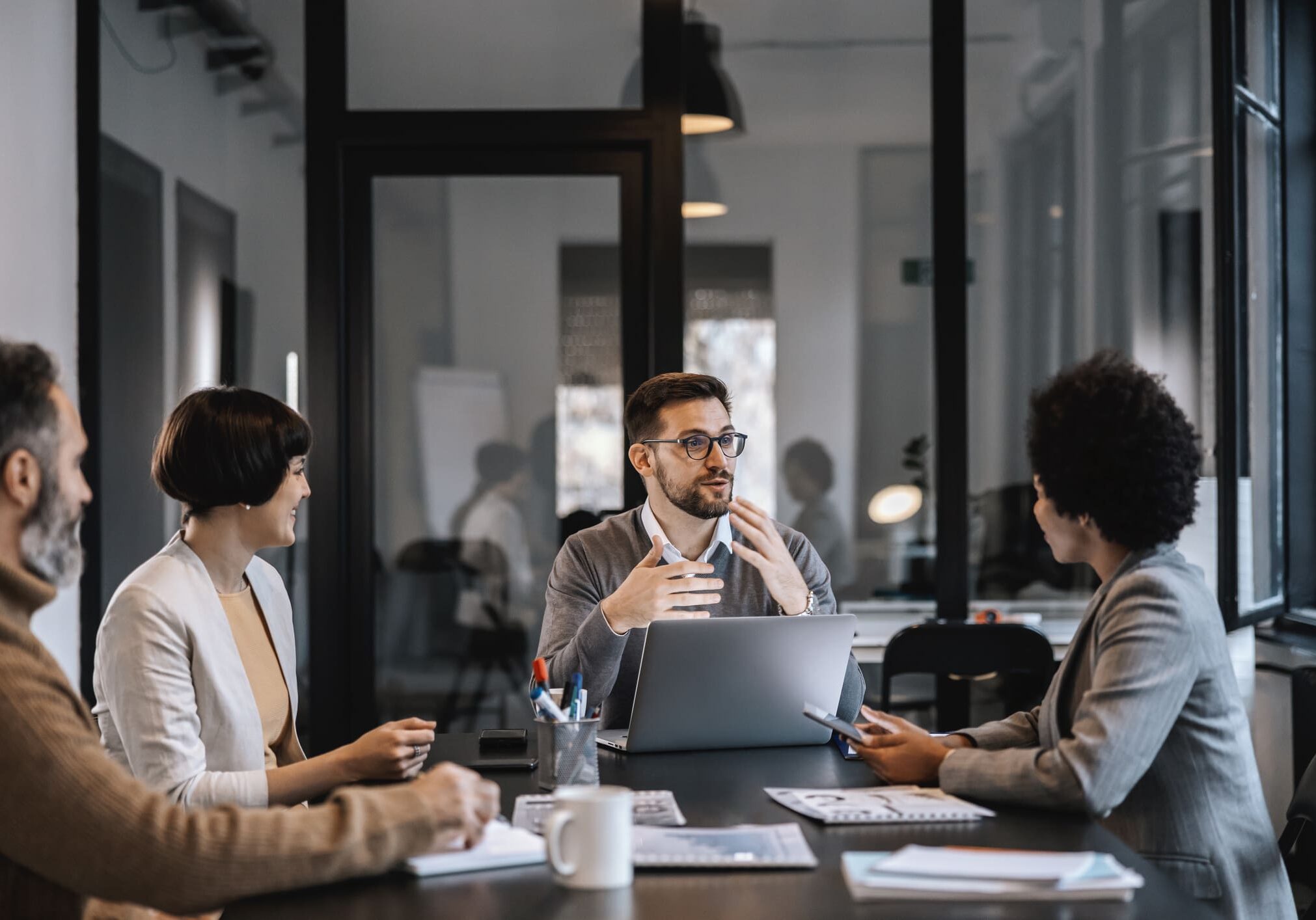 Professionals collaborating around a table